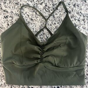 Gymshark sports top, size M, dark green color, like new condition
